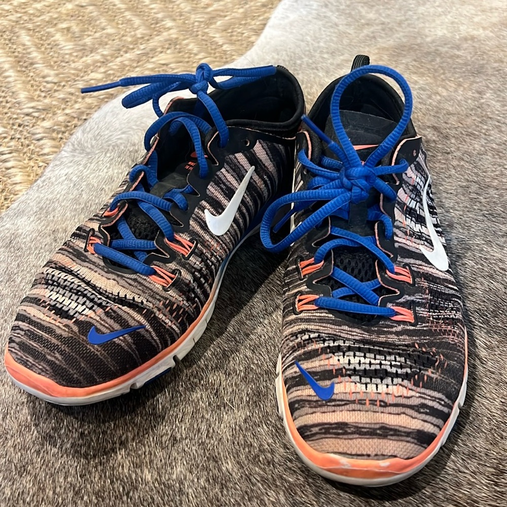 Nike sneakers size 7. Blue, black, and orange